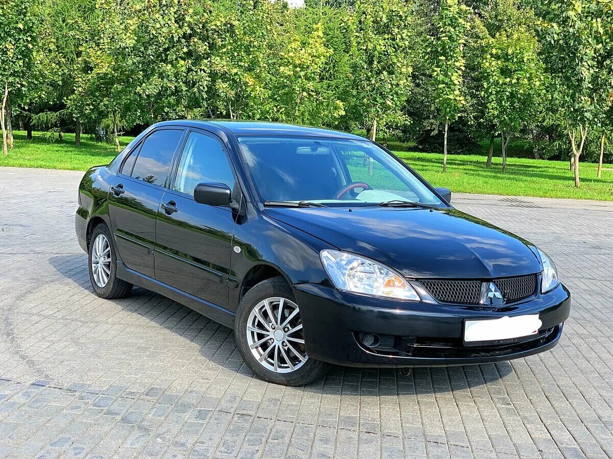Митсубиси 9 фото Купить б/у Mitsubishi Lancer IX Рестайлинг 1.6 AT (98 л.с.) бензин автомат в Мос