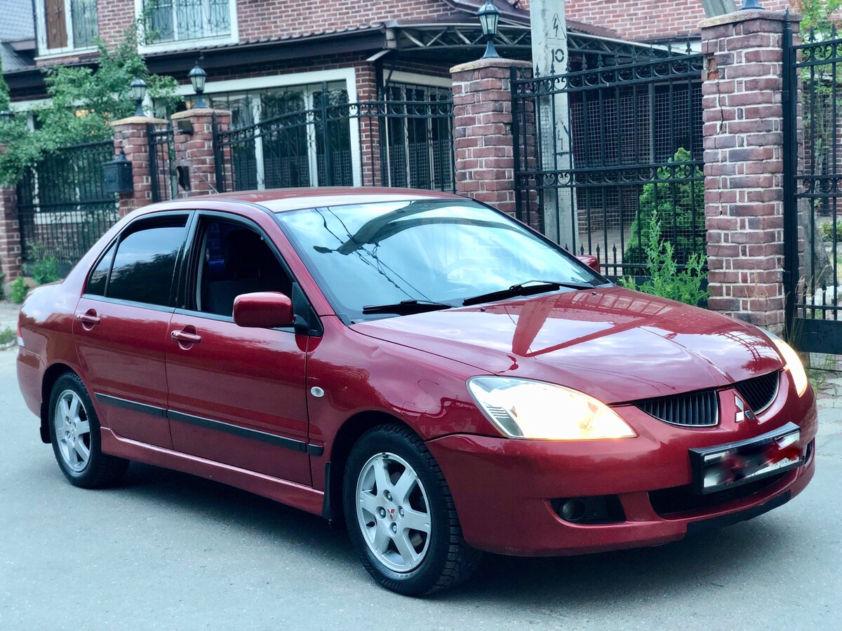 Митсубиси 9 фото Купить б/у Mitsubishi Lancer IX 1.6 AT (98 л.с.) бензин автомат в Москве: красны