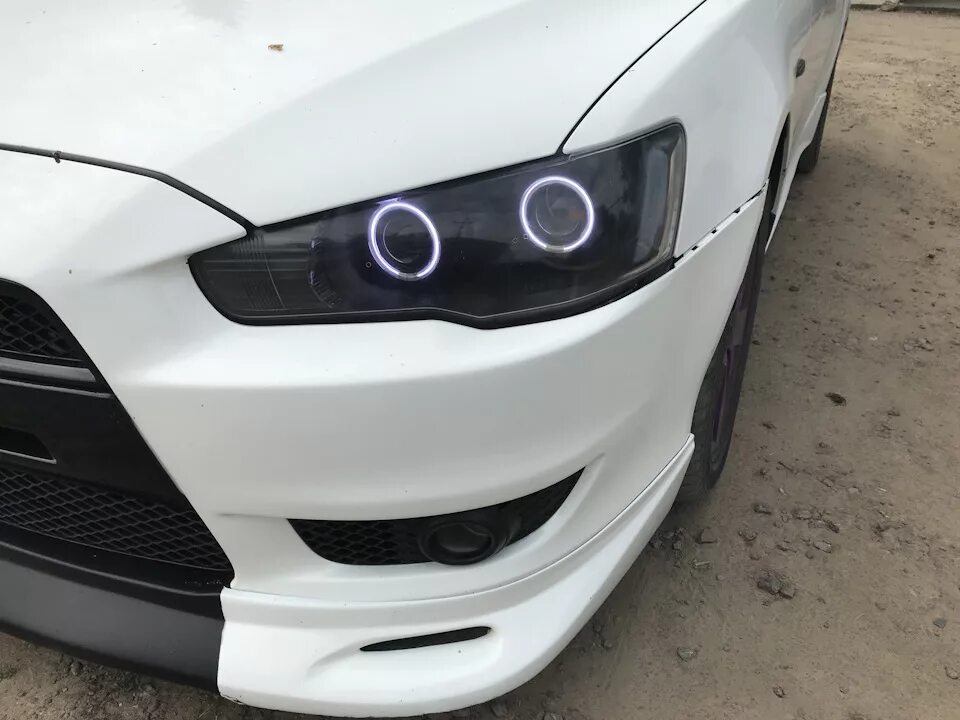 Митсубиси лансер тюнинг фар купить Обновил оптику, линзы + ксенон - Mitsubishi Lancer X, 2 л, 2008 года стайлинг DR