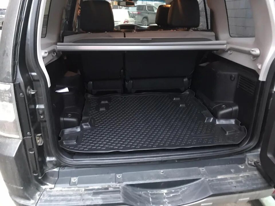 Митсубиси паджеро фото багажника Коврик в багажник - Mitsubishi Pajero (4G), 3 л, 2012 года аксессуары DRIVE2