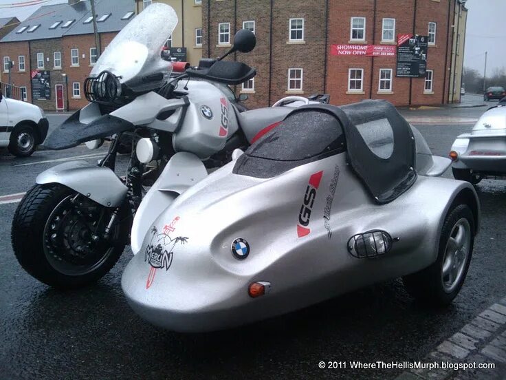 Мотоцикл с закрытой коляской фото It is a pretty cool side car, but it does tend to defeat the purpose of having a