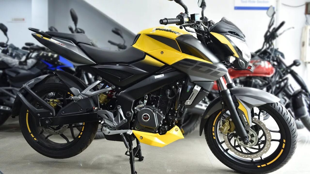 Мотоциклы баджадж пульсар 200 ns 2024 фото 2019 Bajaj Pulsar NS 200 Glossy Yellow Color ABS Price Specification Detailed Re
