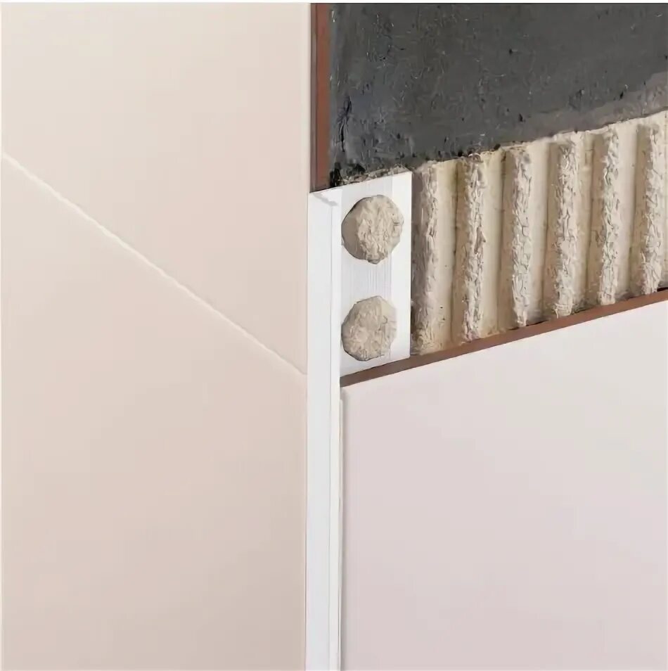 Наружный угол плитки фото Профиль SUELO PVC д/каф.пл. 12х2500мм nsupv12bl25 белый: купить в салоне Casa en