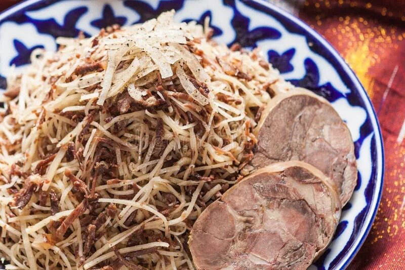 Нарын блюдо узбекское фото Uzbek National Food Pilaf on Traditional Fabric Adras Stock Photo - Image of nor