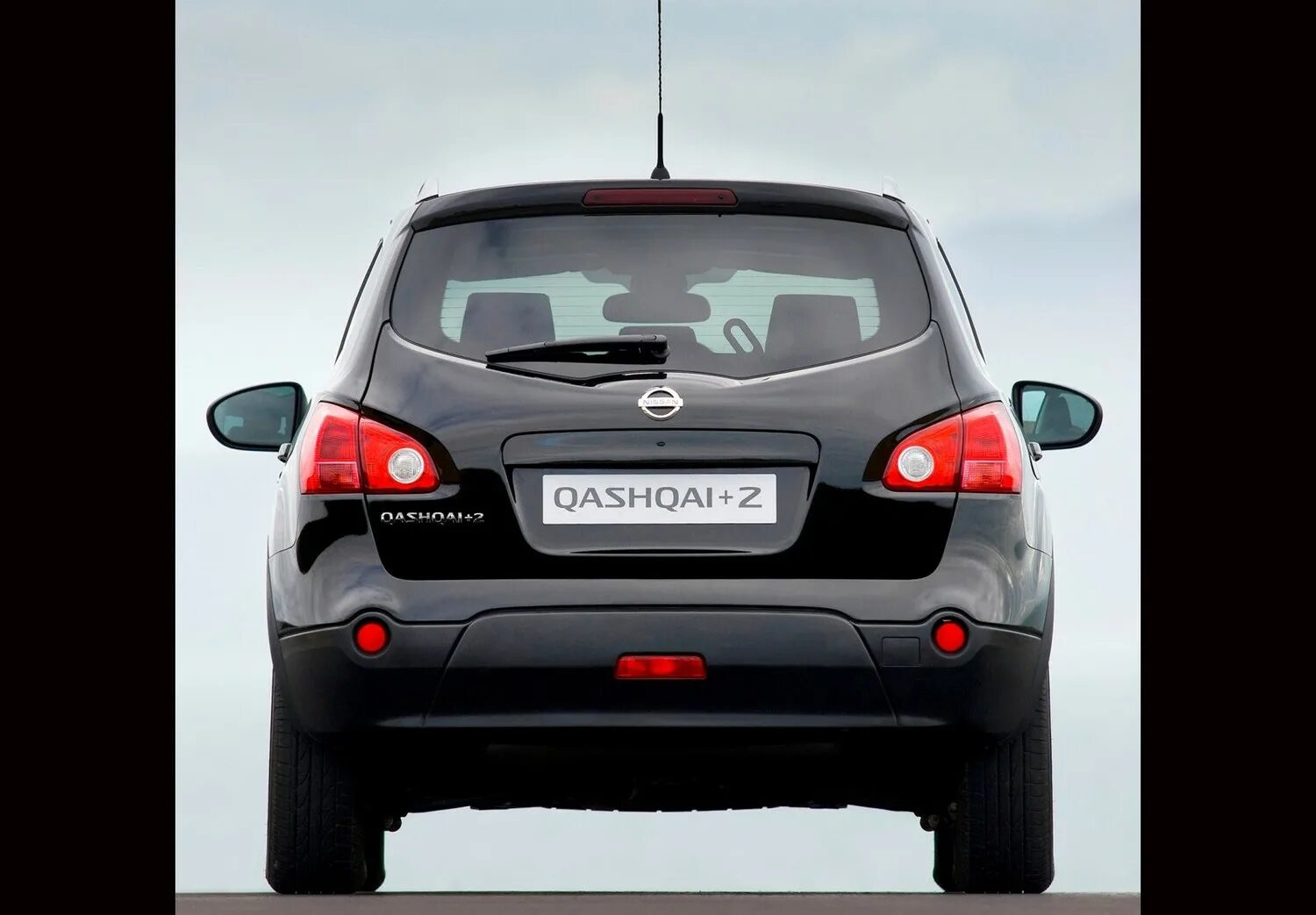 Ниссан кашкай вид сзади фото Nissan Qashqai+2 1 поколение кроссовер