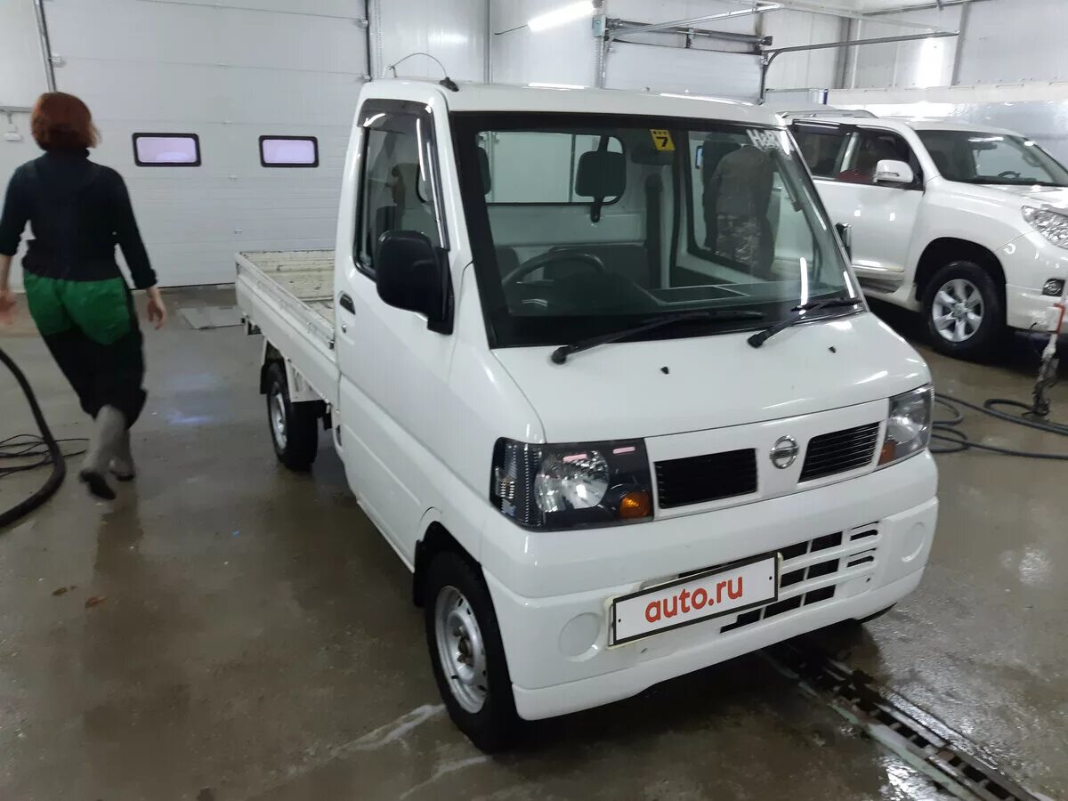 Ниссан клиппер фото Купить б/у Nissan Clipper бензин механика в Чите: белый бортовой грузовик 2009 г