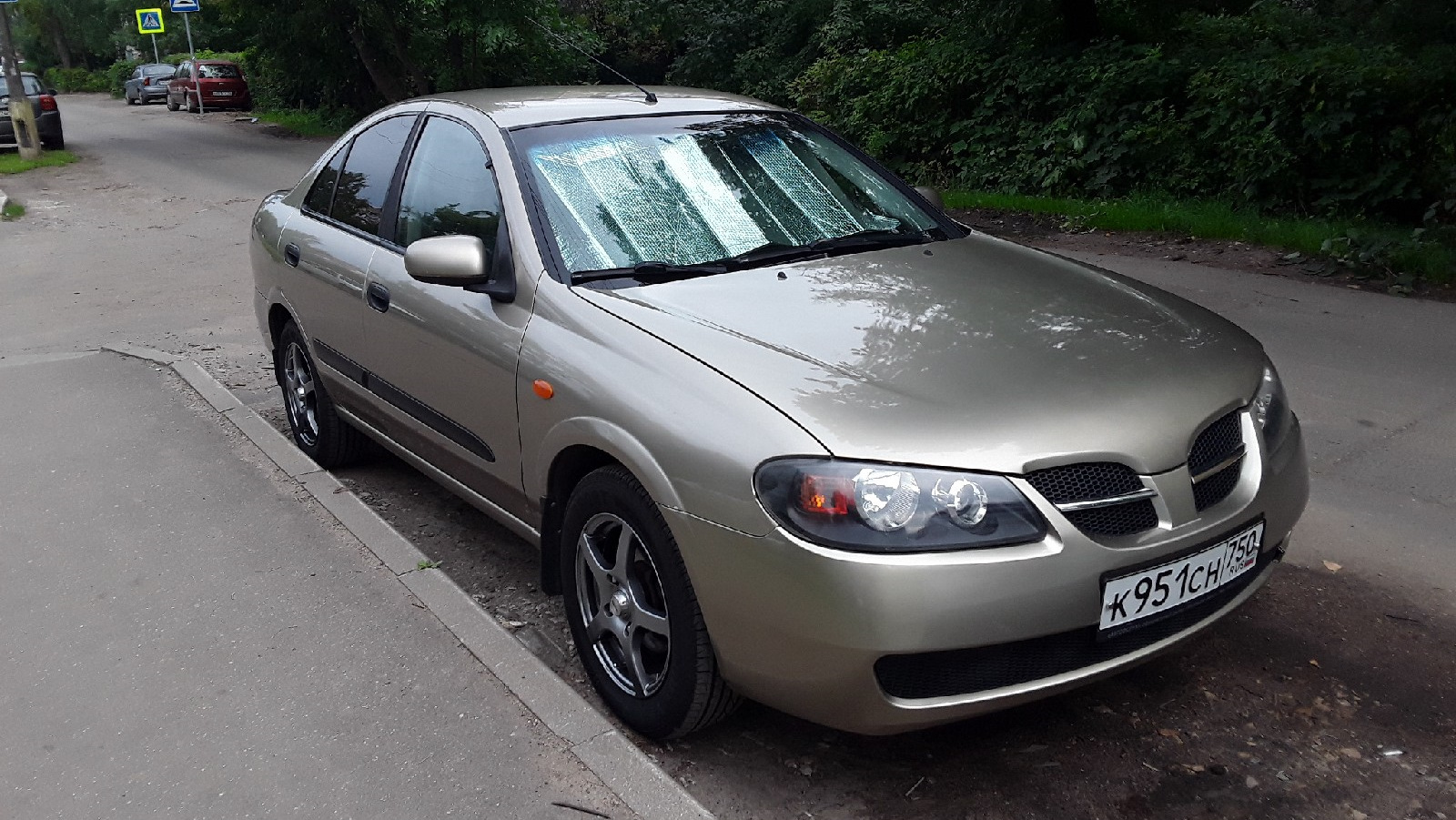 Ниссан комфорт фото Nissan Almera II (N16) 1.5 бензиновый 2004 1.5 Comfort на DRIVE2