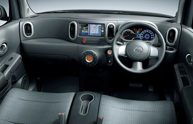 Ниссан куб фото салона Nissan приостанавливает производство модели "Куб"