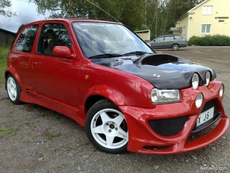 Ниссан микра тюнинг фото Underneath all those modifications there's someone's grandmas Nissan micra! Fail