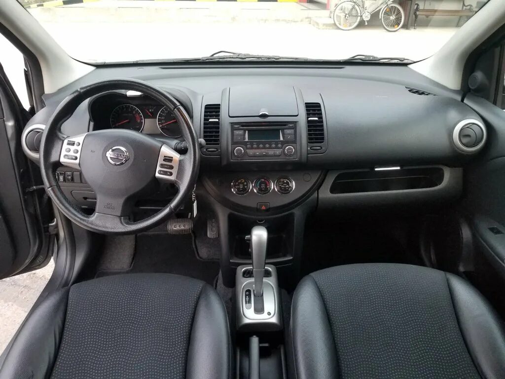 Ниссан ноте фото салона Аренда Nissan Note Автомат 2013 в Тивате, Черногория - Бронь онлайн