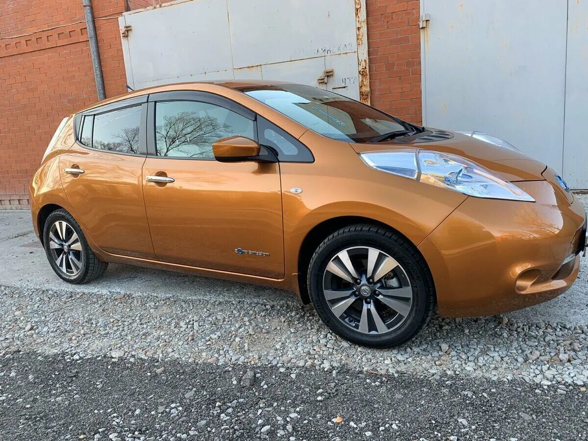 Ниссан оранжевый фото Купить б/у Nissan Leaf I (ZE0/AZE0) Electro AT (80.0 кВт) электро автомат во Вла