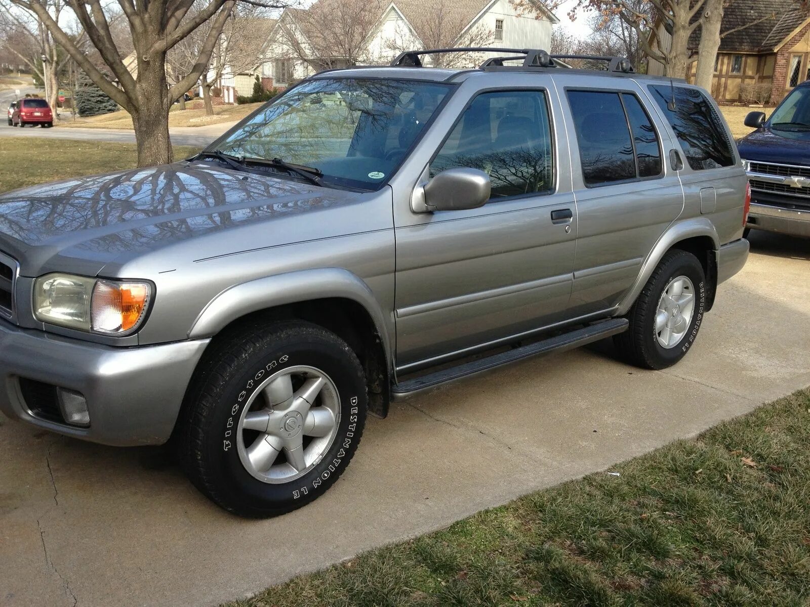 Ниссан патфайндер 1998 года фото 2003 Nissan Pathfinder LE 2WD tekniset tiedot, värit, 0-60, 0-100, neljännesmail
