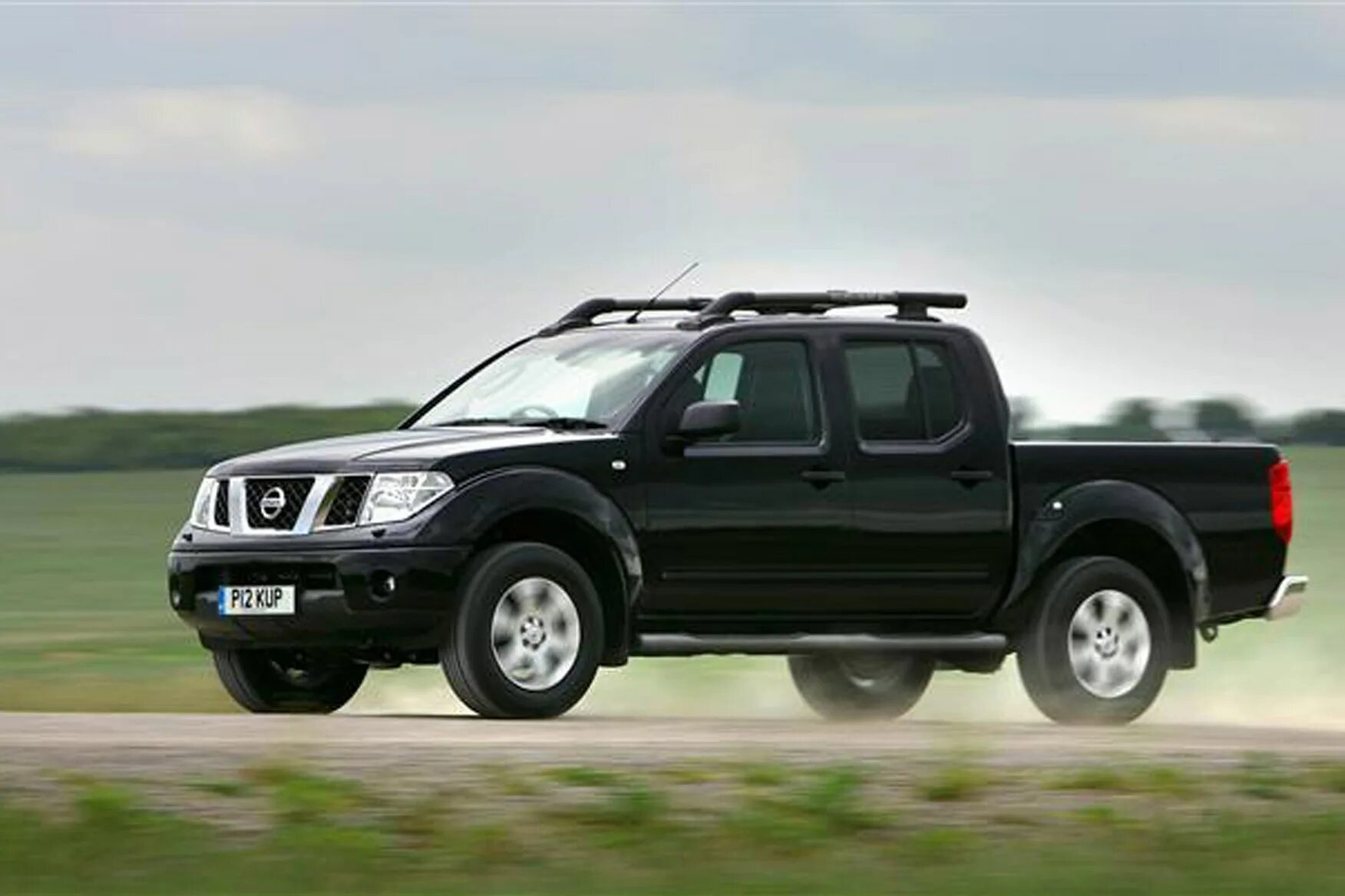 Ниссан патфайндер пикап фото Nissan Navara pickup review (2005-2015)