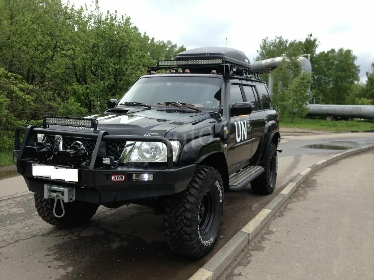 Ниссан патрол y61 тюнинг фото Купить б/у Nissan Patrol V (Y61) Рестайлинг 3.0d MT (160 л.с.) 4WD дизель механи