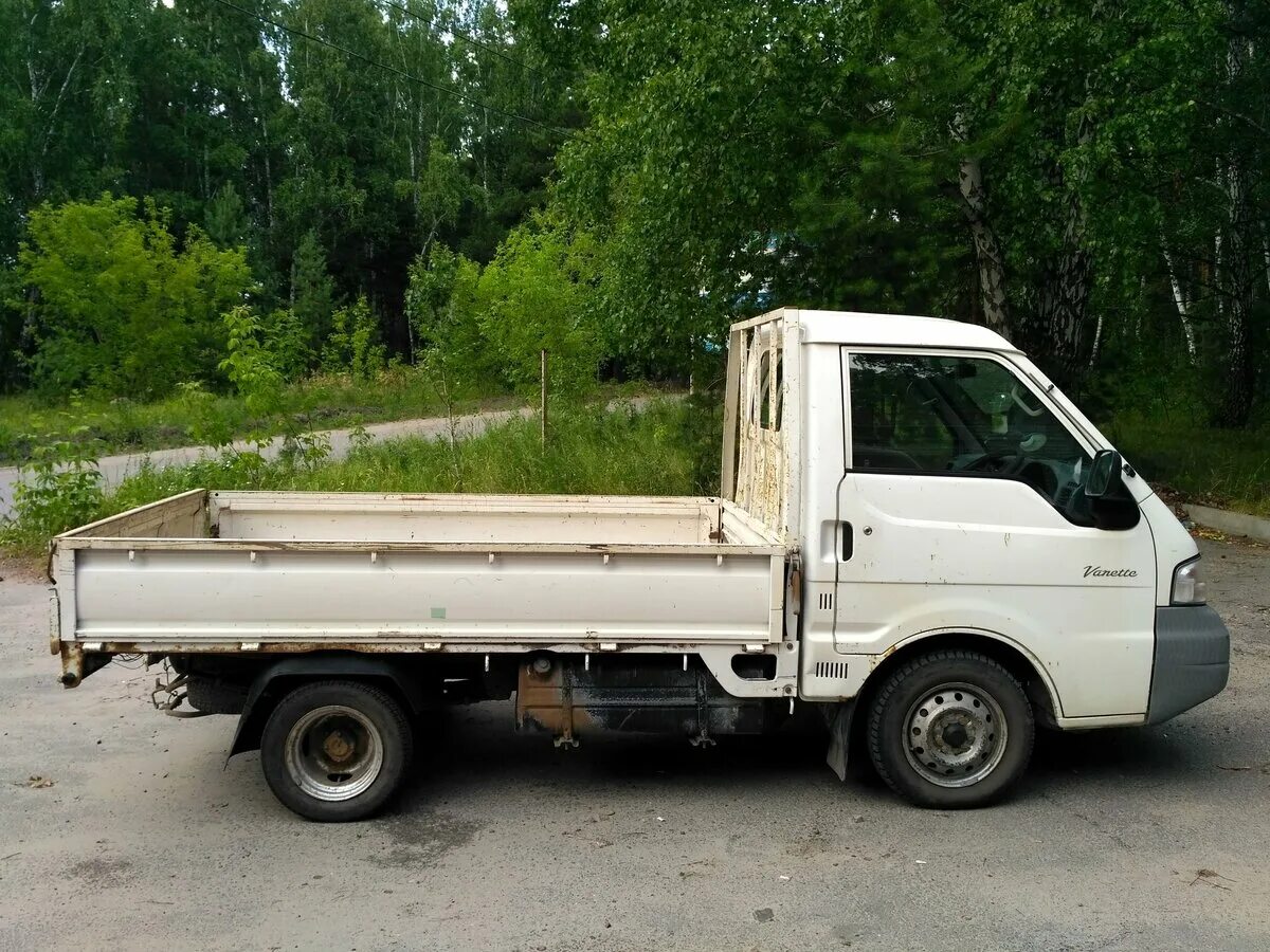 Ниссан портер фото Купить б/у Nissan Vanette дизель автомат в Кургане: белый бортовой грузовик 2002