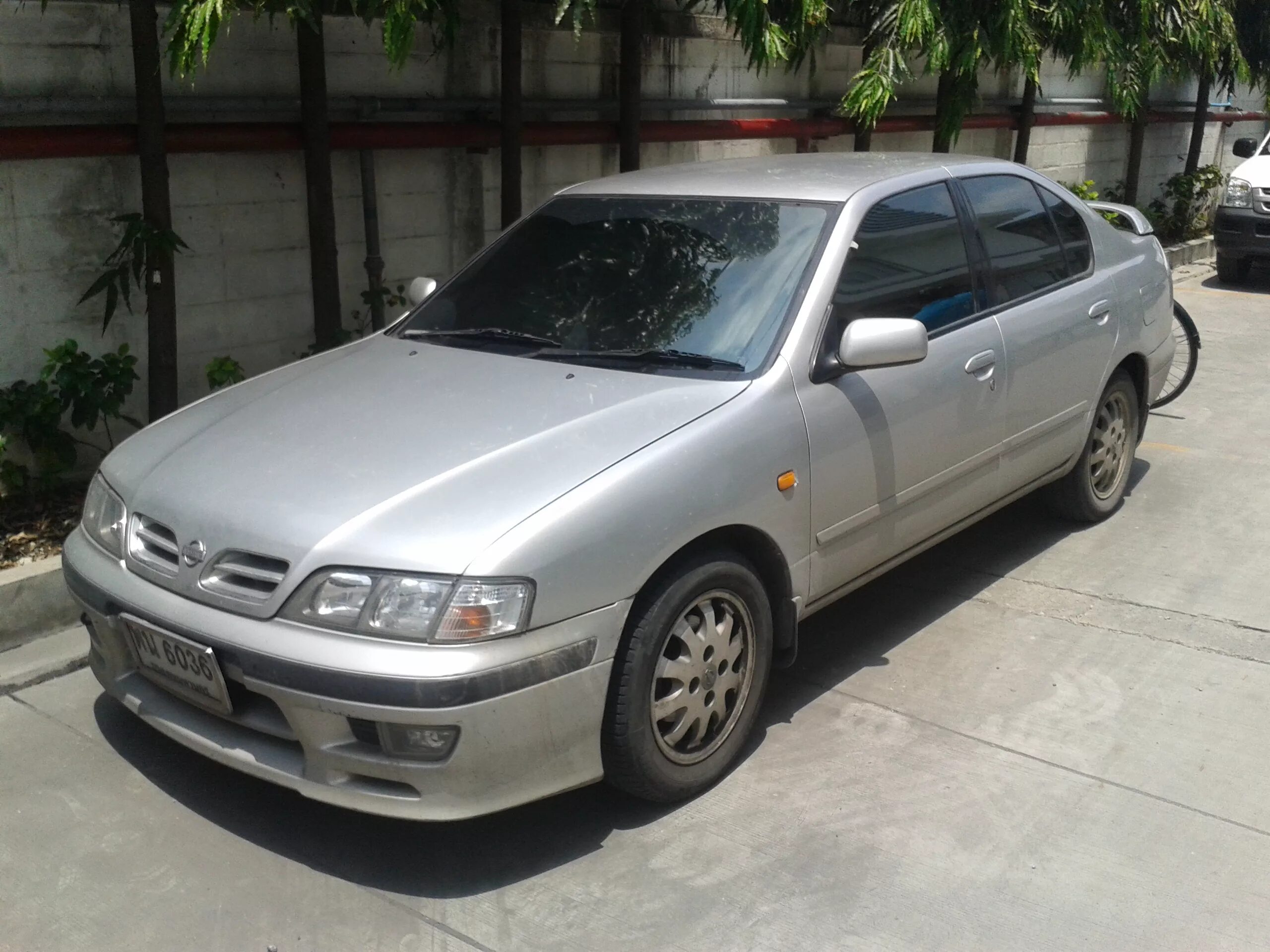 Ниссан правый руль модели фото File:1998 Nissan Primera (P11) GXE sedan front.jpg - Wikimedia Commons