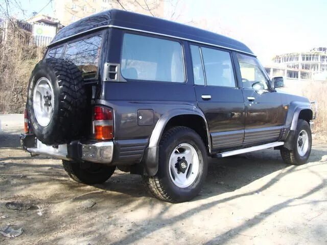 Ниссан сафари фото 1995 Nissan Safari specs