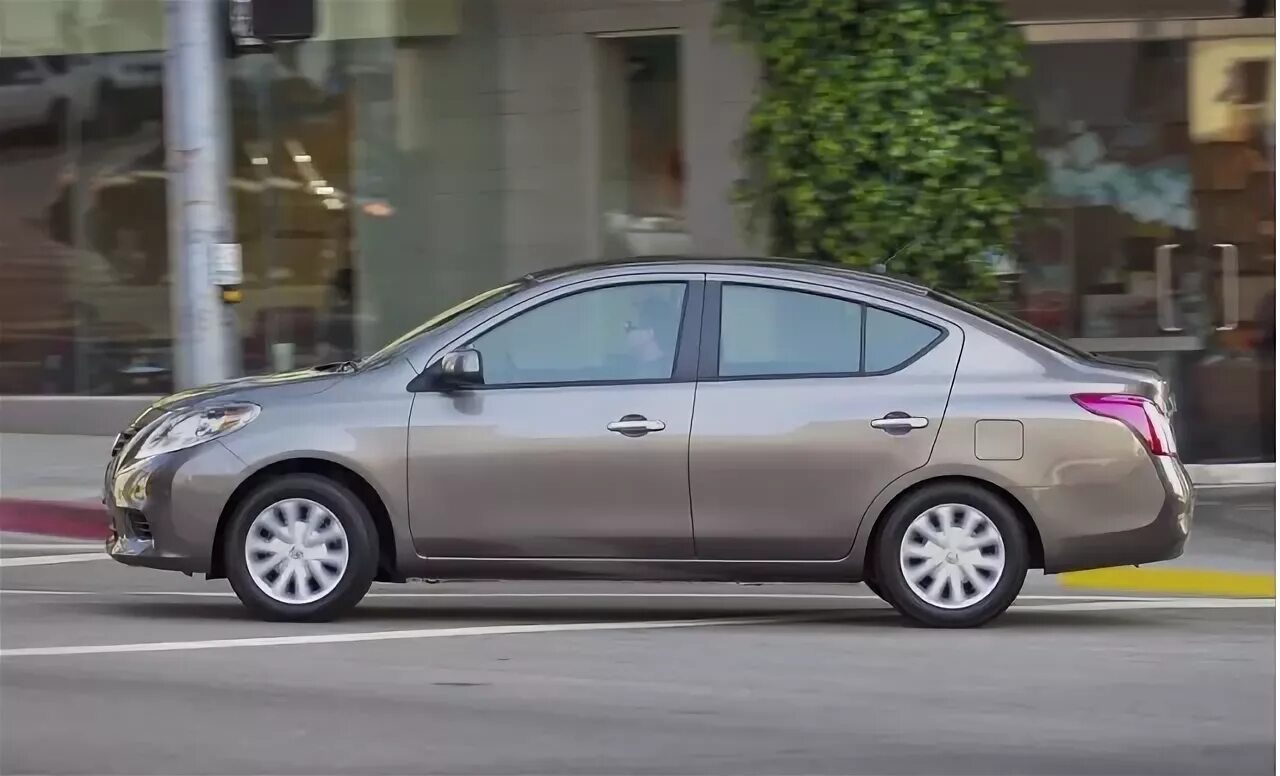 Ниссан седан фото Misers' Models: The Ten Cheapest Cars To Own