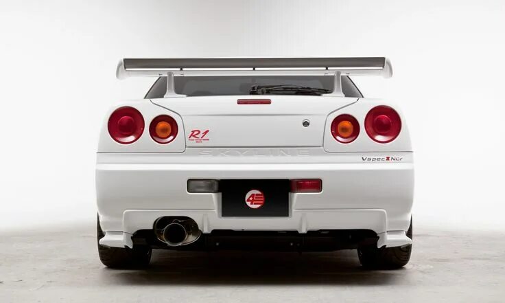 Ниссан скайлайн фото сзади 2002 NISSAN R34 GTR V-SPEC II NÜR NISMO R-TUNE