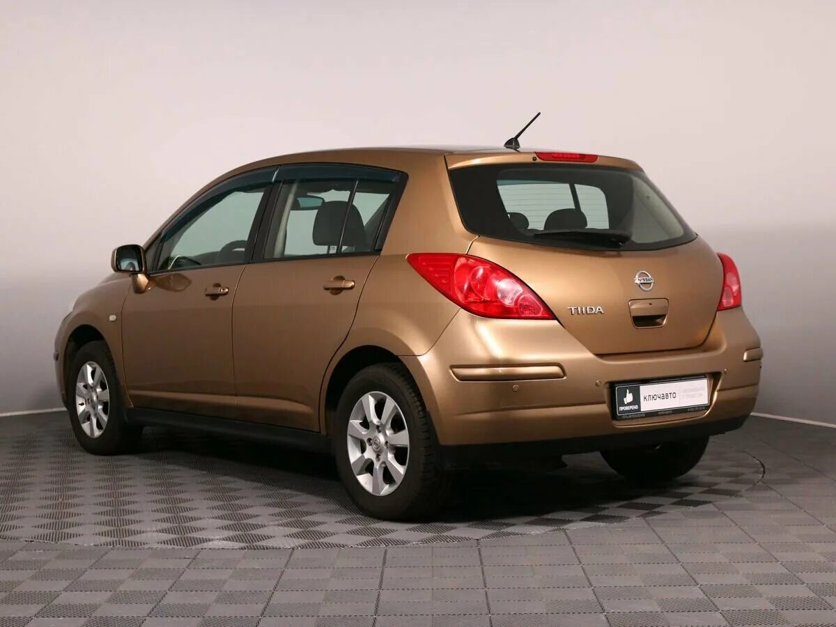 Ниссан тиида фото и цена Купить б/у Nissan Tiida I 1.6 AT (110 л.с.) бензин автомат в Москве: золотистый 
