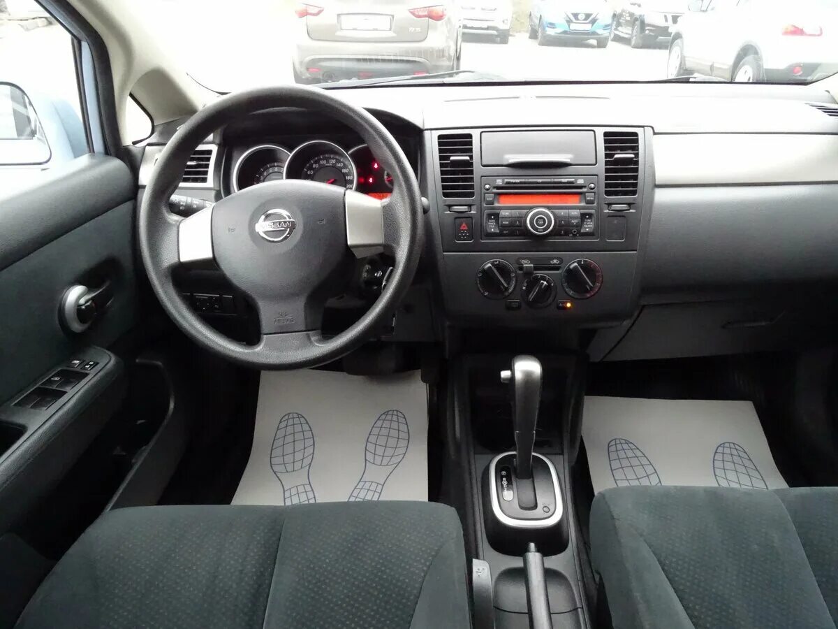 Ниссан тиида фото салона Купить б/у Nissan Tiida I Рестайлинг 1.6 AT (110 л.с.) бензин автомат в Москве: 