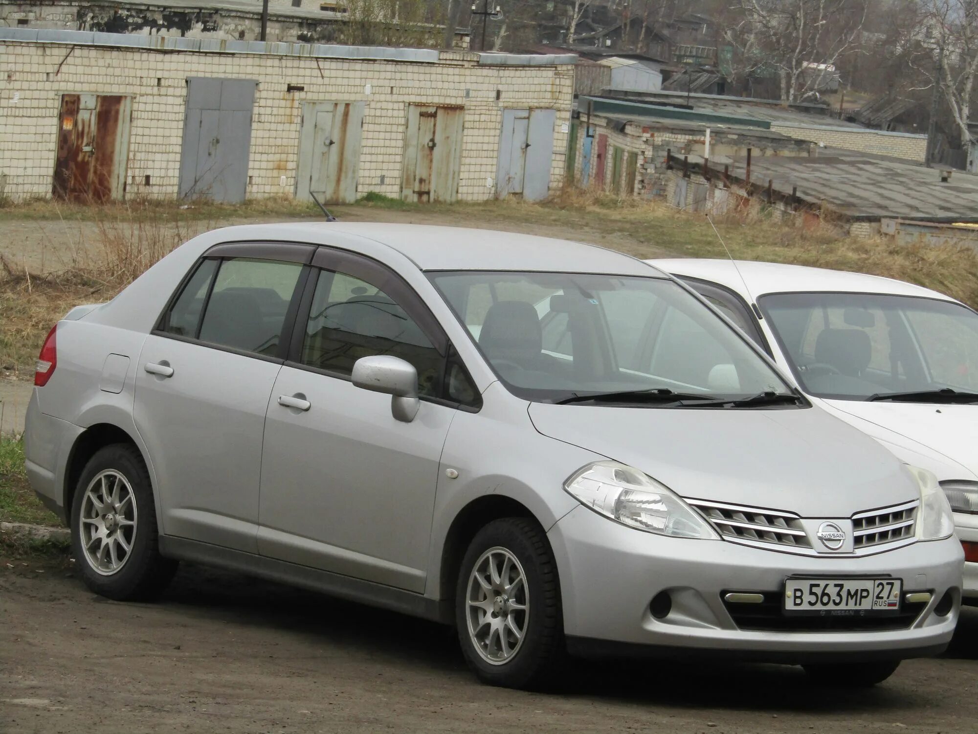 Ниссан тиида латио фото "в 563 мр 27" фото Nissan Tiida. Россия