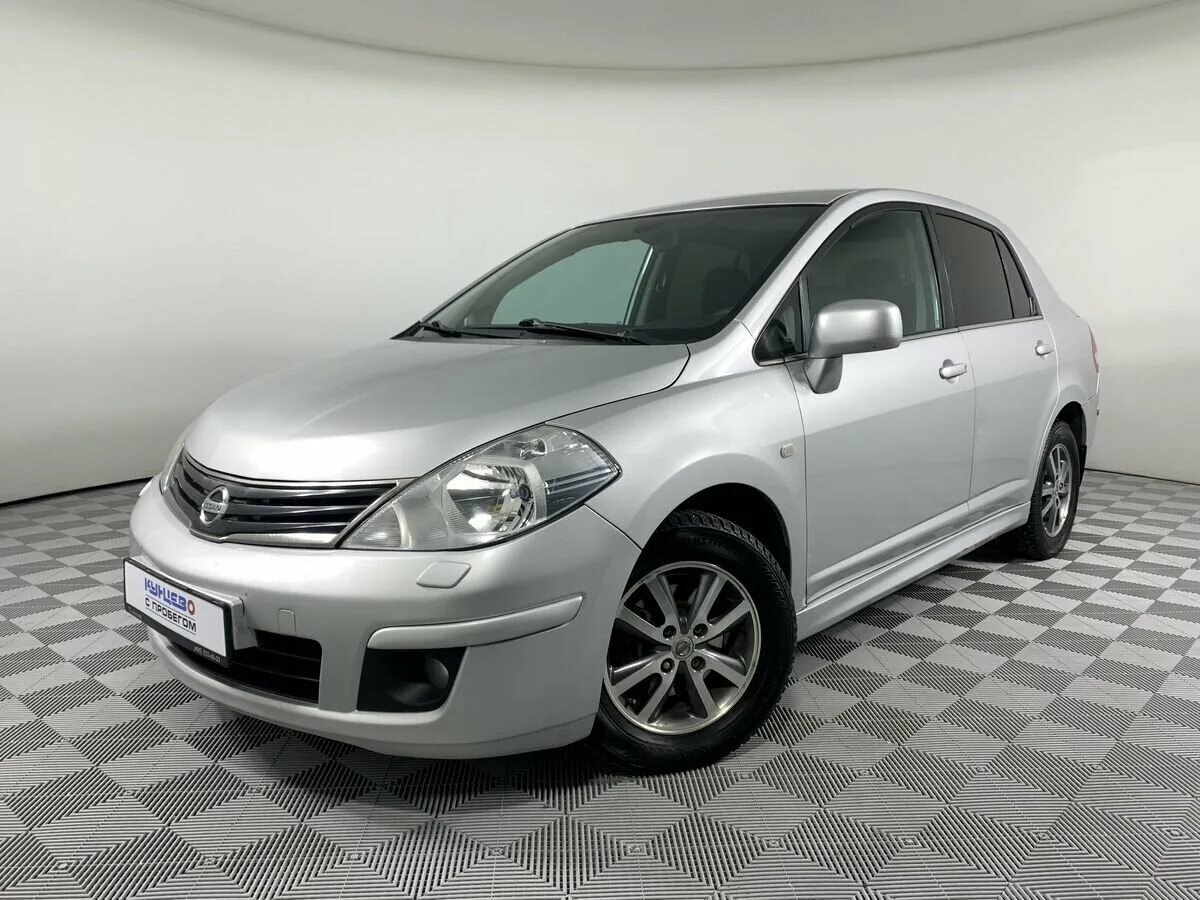Ниссан тиида рестайлинг и дорестайлинг отличия фото Купить б/у Nissan Tiida I Рестайлинг 1.6 AT (110 л.с.) бензин автомат в Москве: 