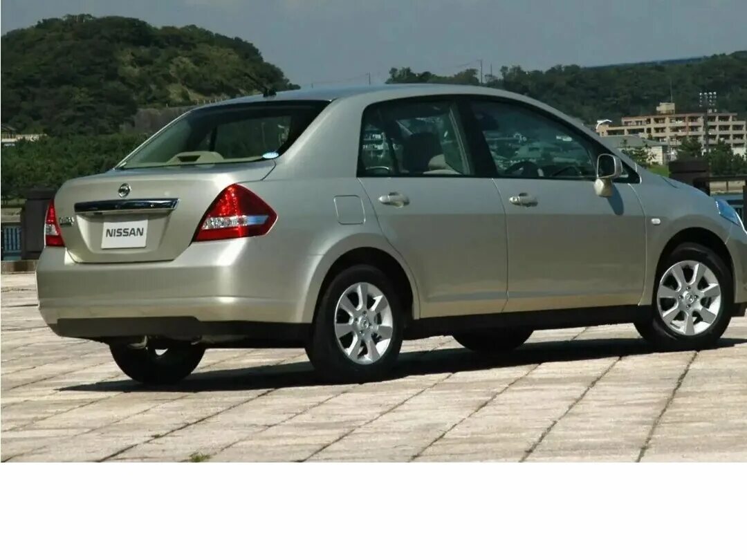 Ниссан тильда фото Купить б/у Nissan Tiida I Рестайлинг 1.6 MT (110 л.с.) бензин механика в Челябин