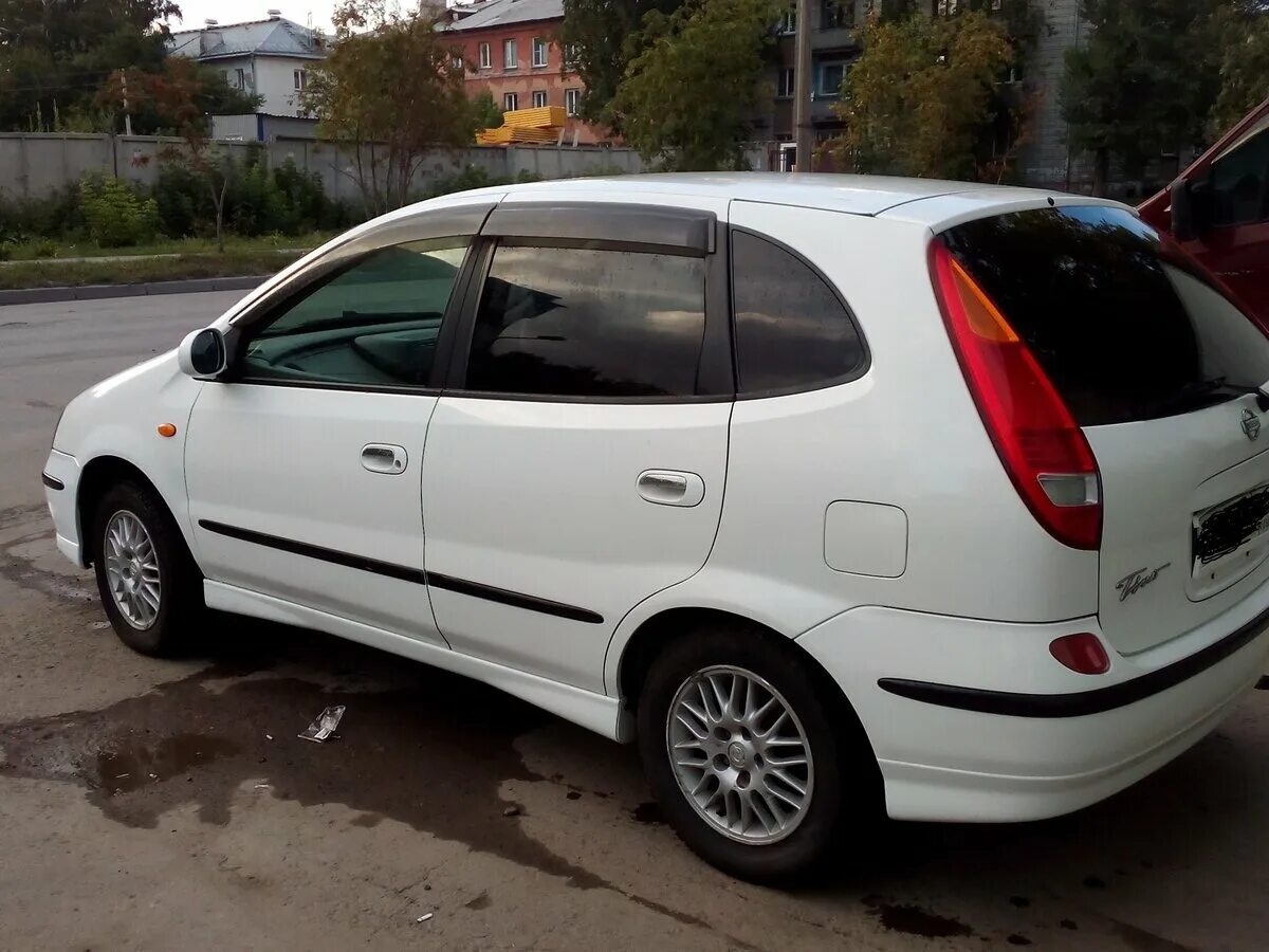 Ниссан тино фото Купить б/у Nissan Tino 1998-2003 1.8 AT (120 л.с.) бензин автомат в Новосибирске
