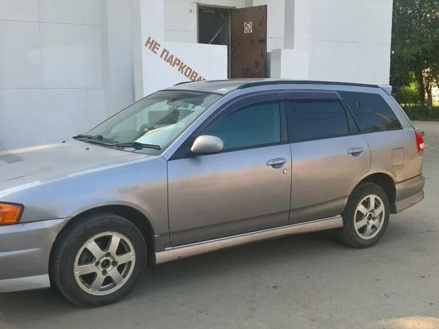 Ниссан универсал фото Купить б/у Nissan Wingroad II (Y11) 1.5 AT (105 л.с.) бензин автомат в Челябинск
