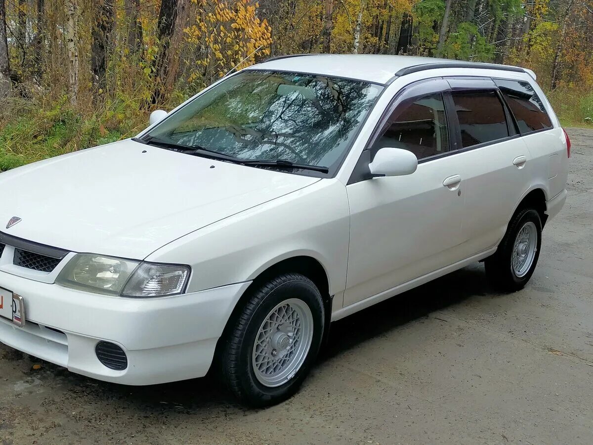Ниссан универсал фото Купить б/у Nissan Wingroad II (Y11) 1.5 AT (105 л.с.) бензин автомат в Томске: б