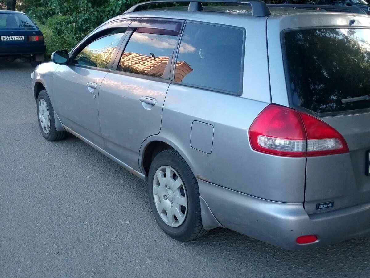 Ниссан универсал фото Купить б/у Nissan Wingroad II (Y11) Рестайлинг 1.8 AT (122 л.с.) 4WD бензин авто