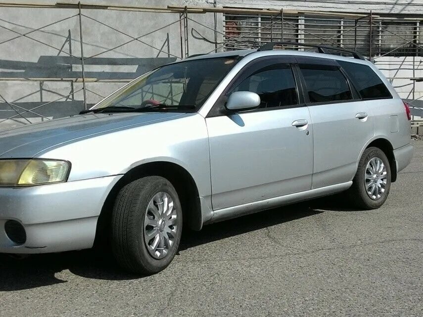 Ниссан универсал модели фото Купить б/у Nissan Wingroad II (Y11) 1.8 AT (120 л.с.) 4WD бензин автомат в Новок
