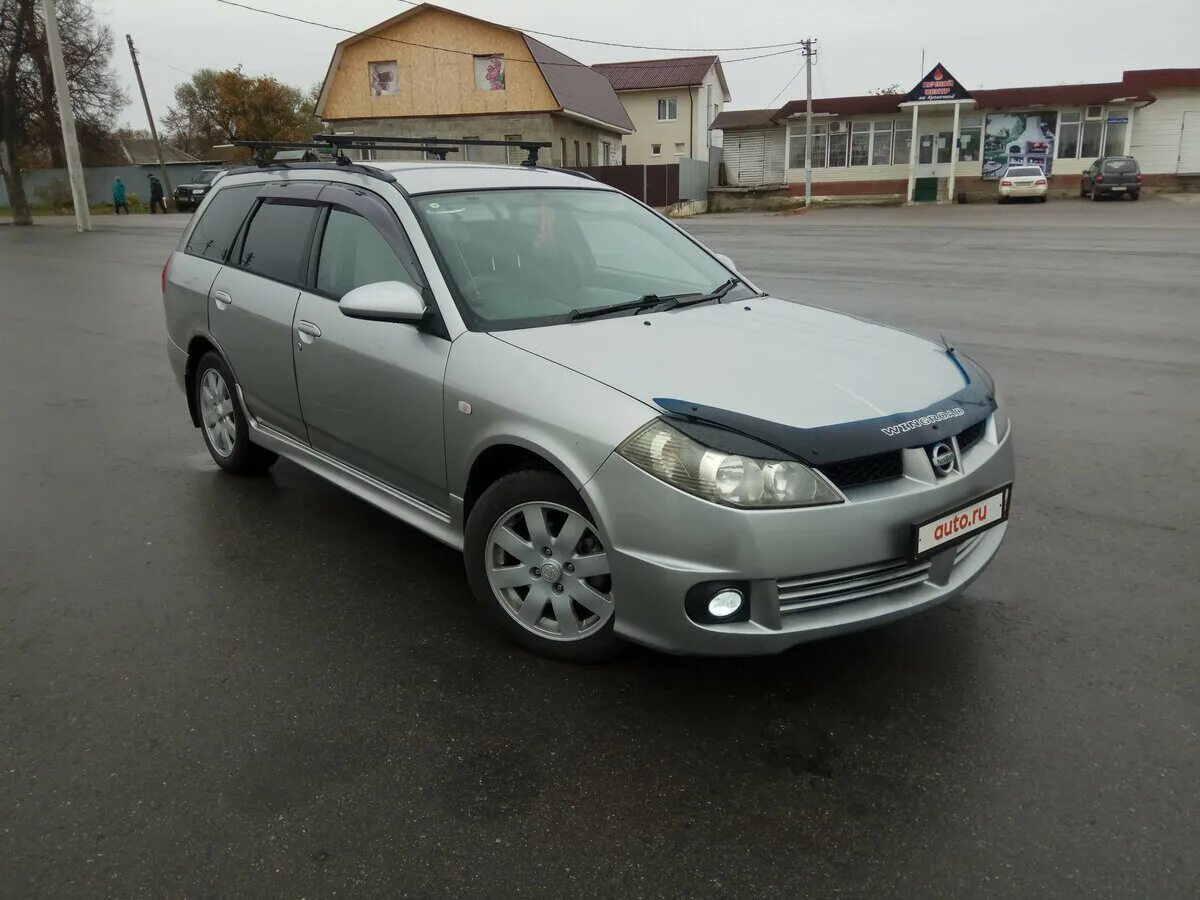 Ниссан wingroad фото Купить б/у Nissan Wingroad II (Y11) Рестайлинг 1.5 AT (105 л.с.) бензин автомат 