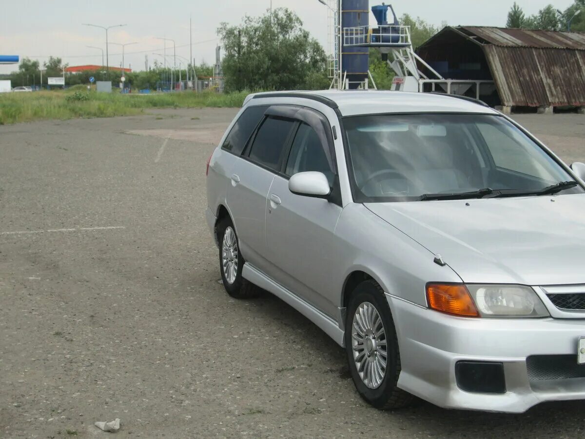 Ниссан wingroad фото Купить б/у Nissan Wingroad II (Y11) Рестайлинг 1.5 AT (105 л.с.) бензин автомат 