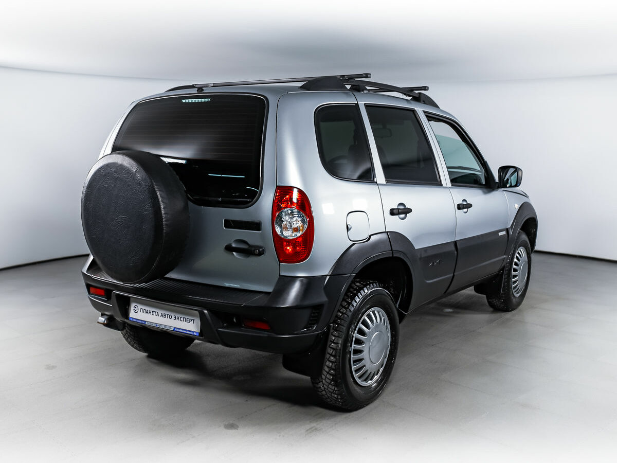 Нива 212300 фото Купить б/у Chevrolet Niva I Рестайлинг 1.7 MT (80 л.с.) 4WD бензин механика в Че