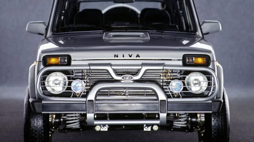 Нива фото спереди Lada 2131 1.2 бензиновый 2000 на DRIVE2