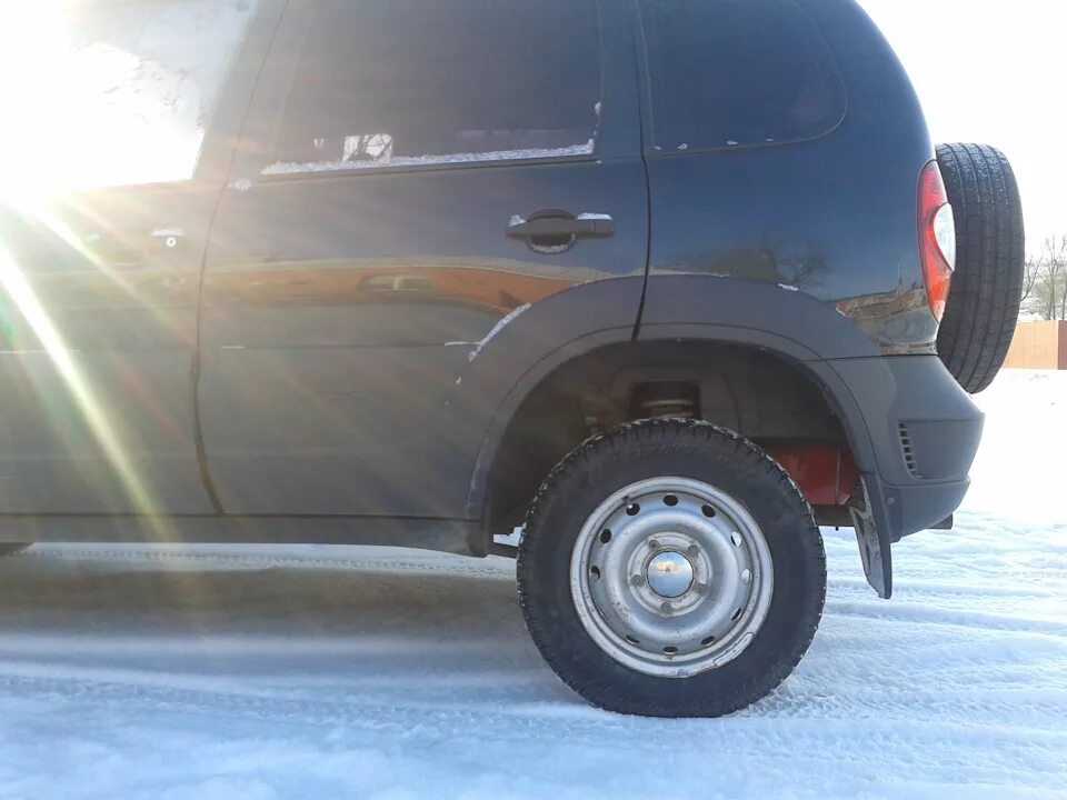 Нива на проставках фото Ручник, проставки - Chevrolet Niva, 1,7 л, 2013 года тюнинг DRIVE2