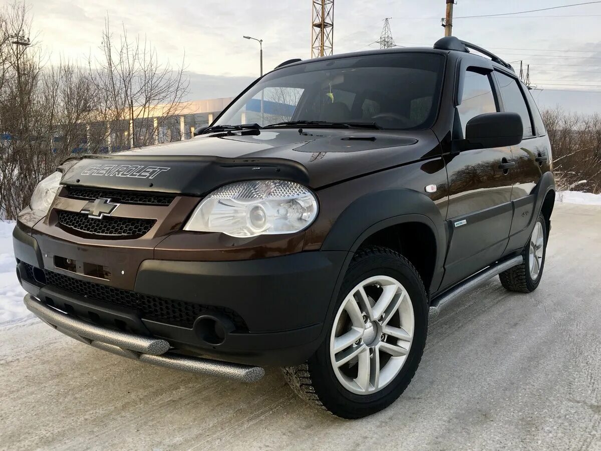 Нива шевроле 2013 года фото Купить б/у Chevrolet Niva I Рестайлинг 1.7 MT (80 л.с.) 4WD бензин механика в Зл