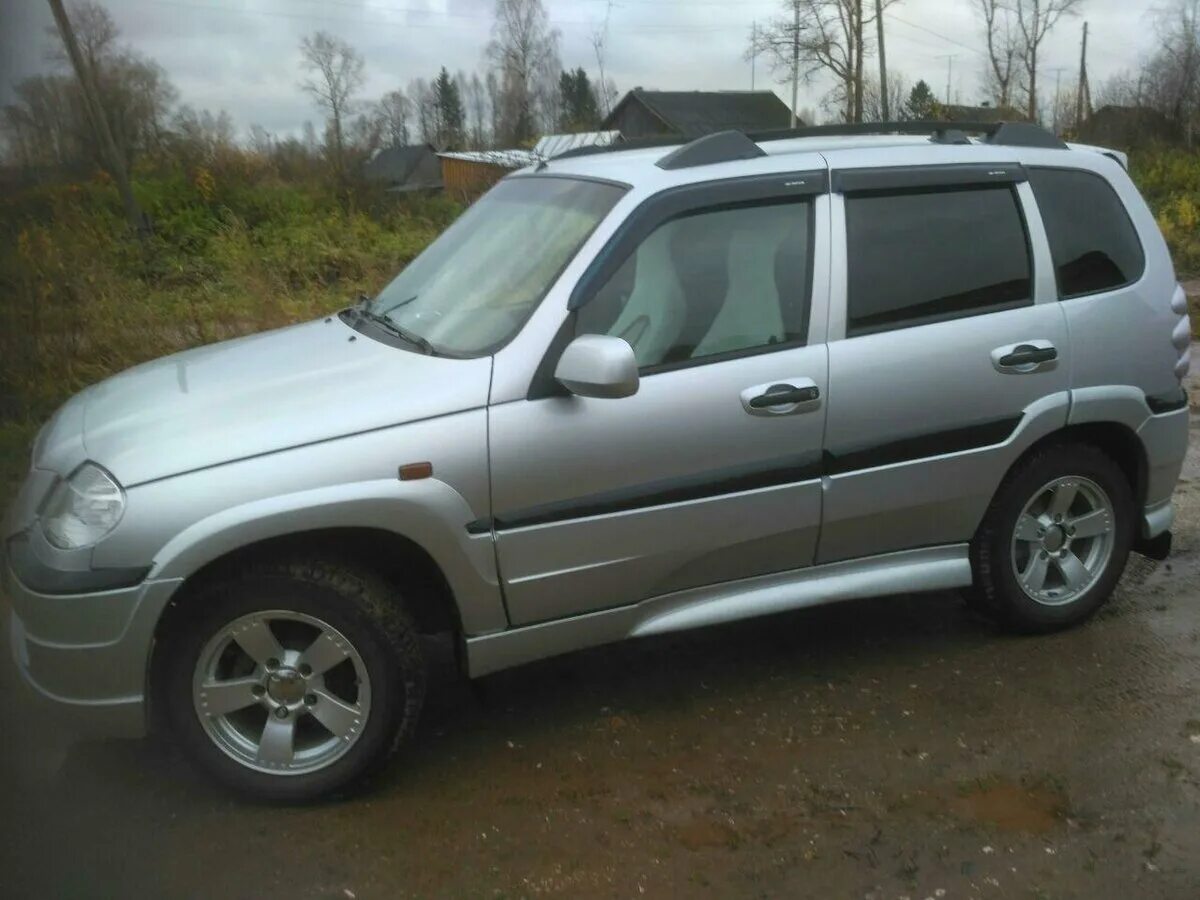 Нива шевроле атака фото Купить б/у Chevrolet Niva I 1.7 MT (80 л.с.) 4WD бензин механика в Москве: сереб