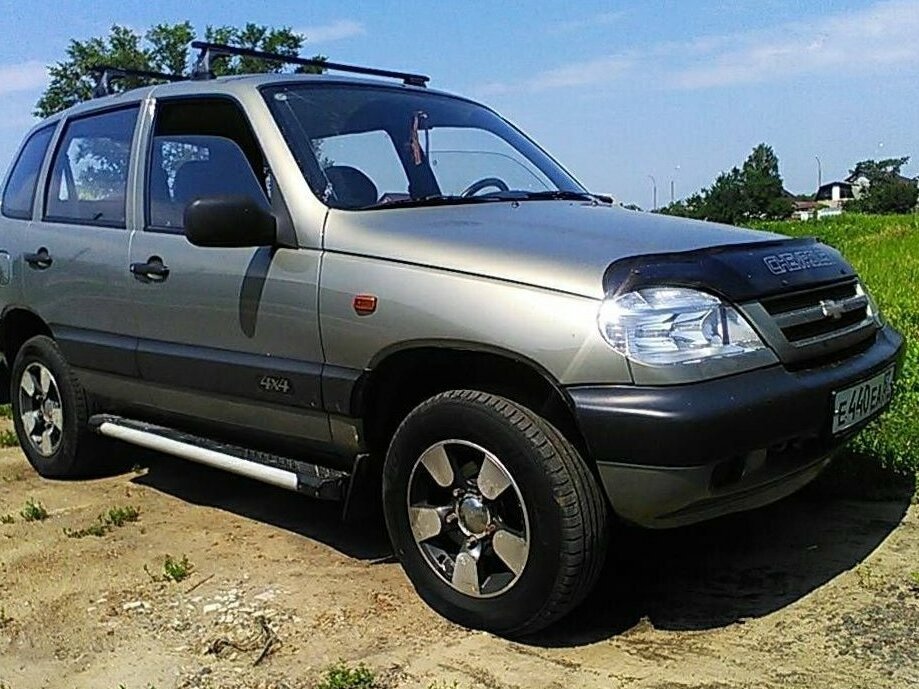 Нива шевроле б у фото Купить б/у Chevrolet Niva I 1.7 MT (80 л.с.) 4WD бензин механика в Курске: серый