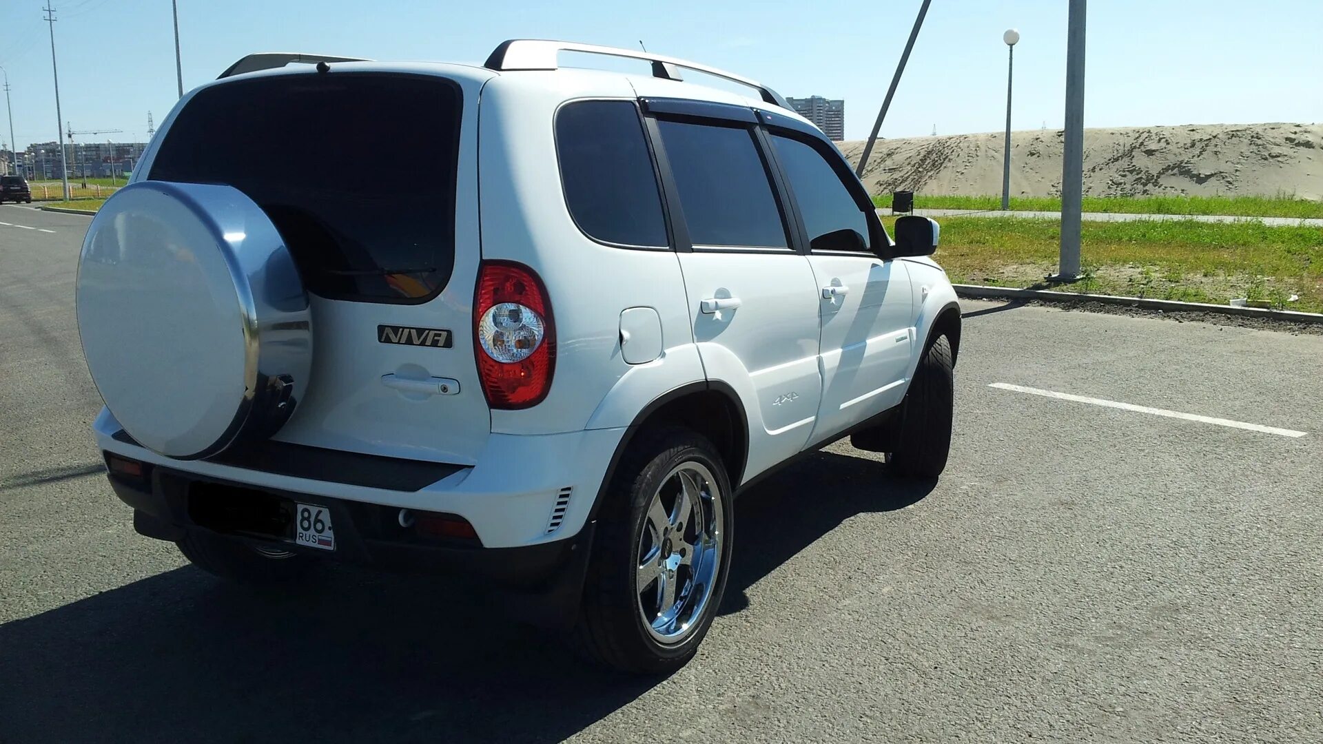 Нива шевроле белая тюнинг Chevrolet Niva 1.7 бензиновый 2012 ГоРоДсКоЙ жИтЕлЬ ))) на DRIVE2