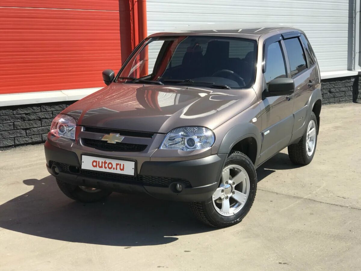 Нива шевроле бертоне фото Купить б/у Chevrolet Niva I Рестайлинг 1.7 MT (80 л.с.) 4WD бензин механика в Ни