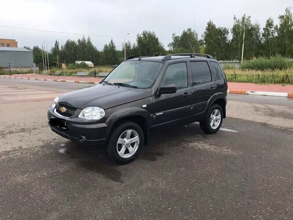 Нива шевроле фото 2016 года Купить б/у Chevrolet Niva I Рестайлинг 1.7 MT (80 л.с.) 4WD бензин механика в Ка