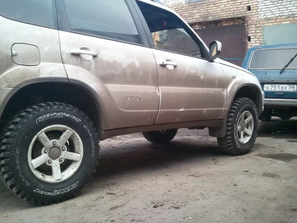 Нива шевроле фото колес Лифт кузова и установка 29 колес - Chevrolet Niva, 1,7 л, 2012 года тюнинг DRIVE