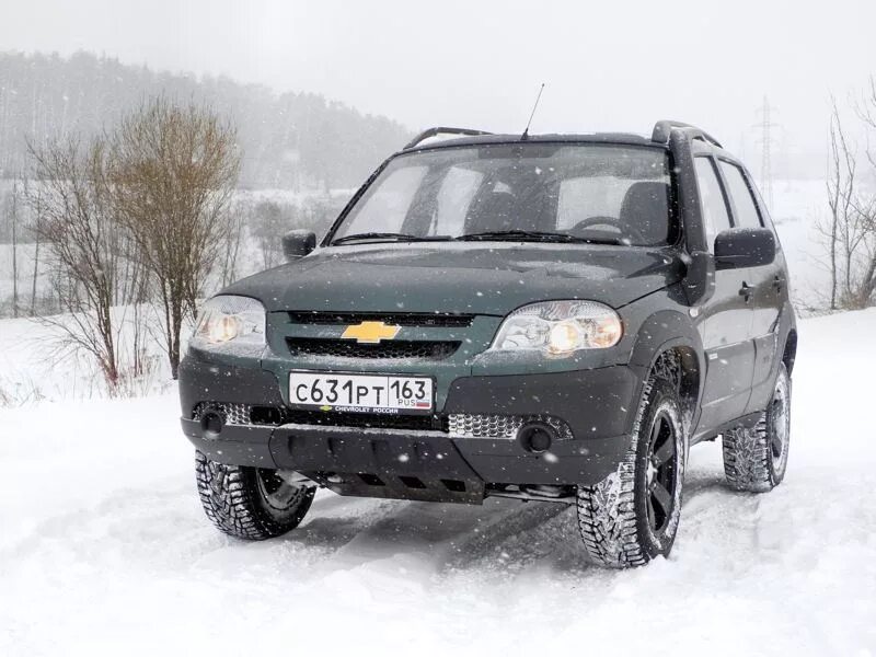 Нива шевроле фото спереди Фото Chevrolet Niva - В комплектации LE присутствует защита картера. Отличное по