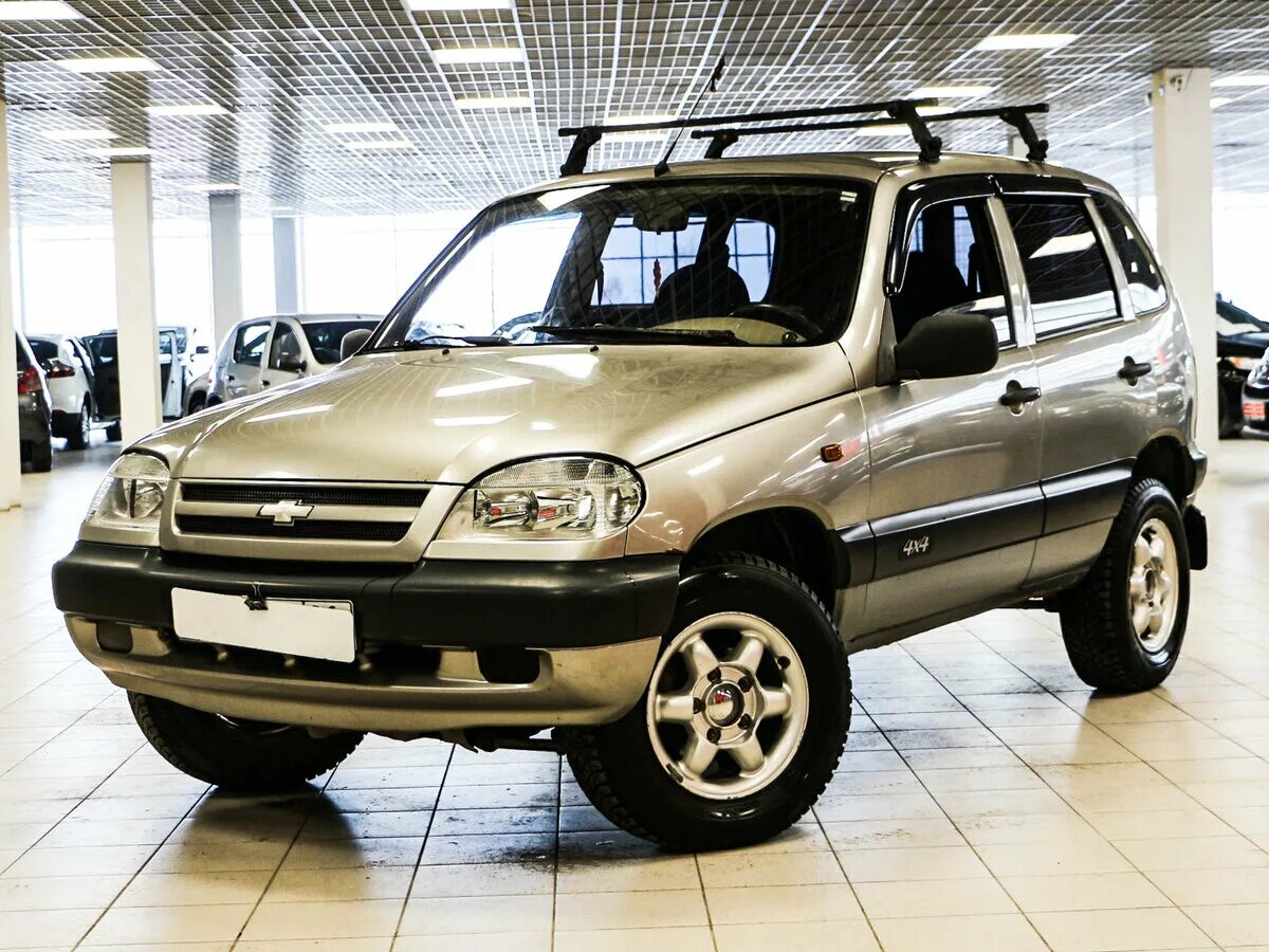 Нива шевроле фото цена характеристики Купить б/у Chevrolet Niva I 1.7 MT (80 л.с.) 4WD бензин механика в Екатеринбурге