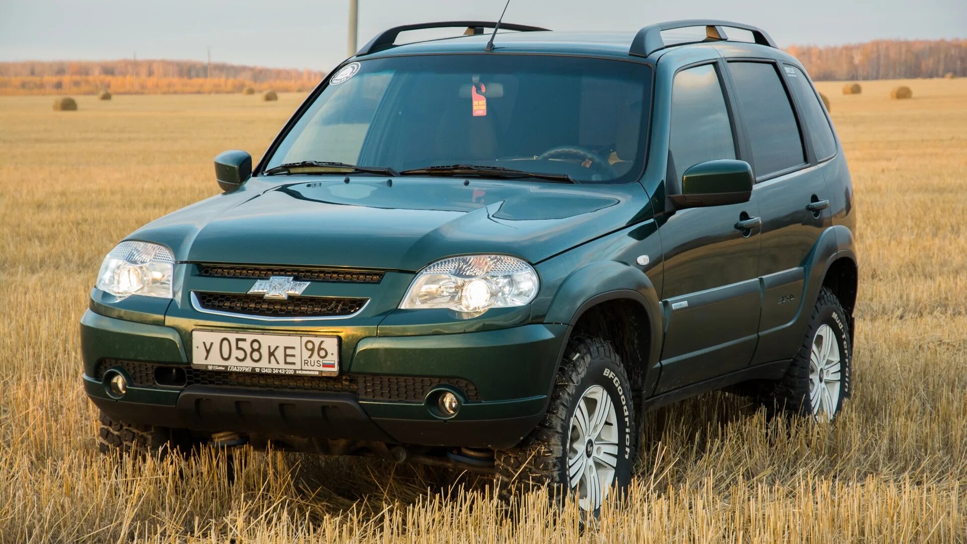 Нива шевроле фото цена характеристики Chevrolet Niva 1.7 бензиновый 2012 Темно-зелёный (ШЕРВУД) на DRIVE2