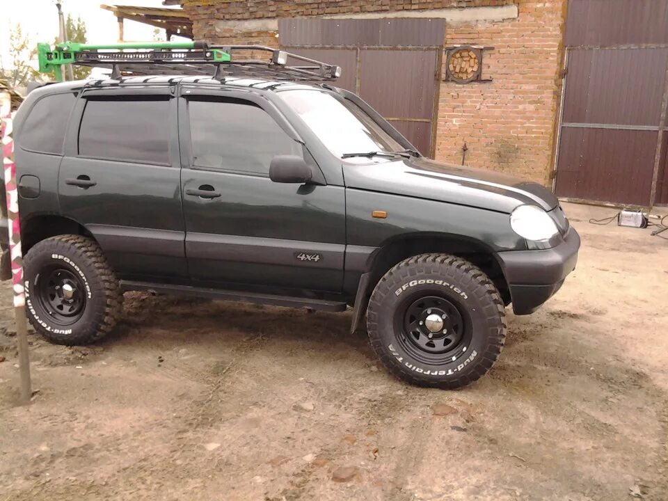 Нива шевроле резина фото бф гудрич км2 - Chevrolet Niva, 2 л, 2004 года шины DRIVE2