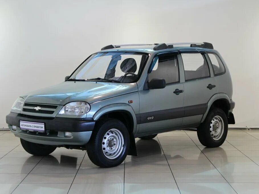 Нива шевроле цена фото бу Купить б/у Chevrolet Niva I 1.7 MT (80 л.с.) 4WD бензин механика в Рязани: серый